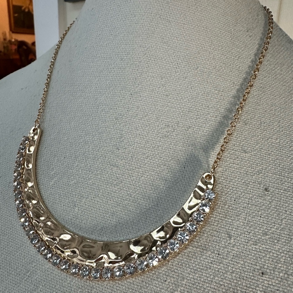 Goldtone half circle hammered rhinestone necklace